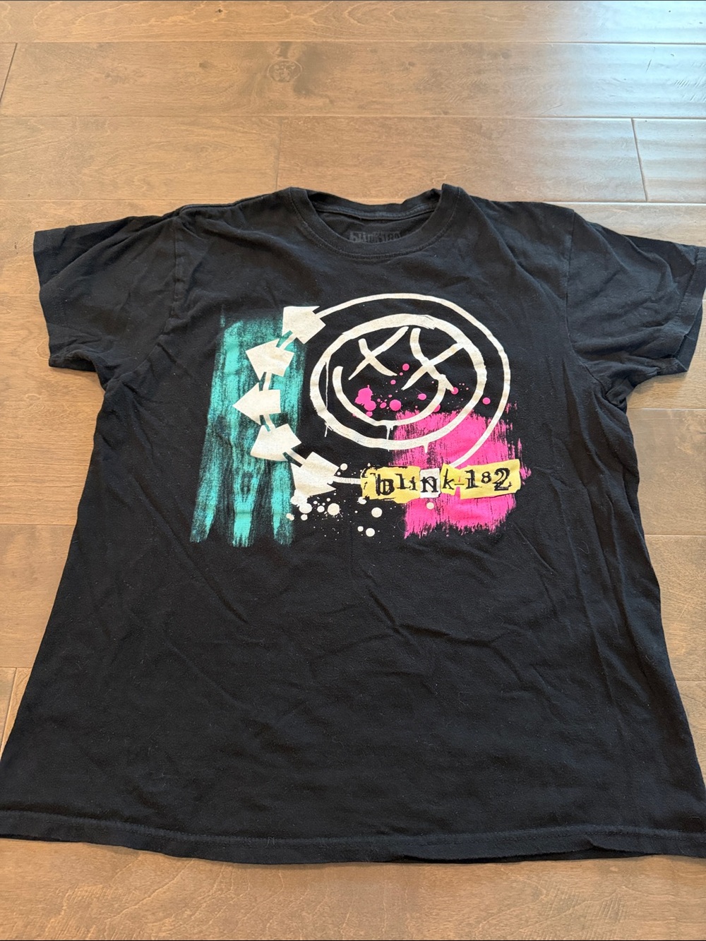 Blink-182 Womens Black Graphic Tee with Pink & Teal Accents